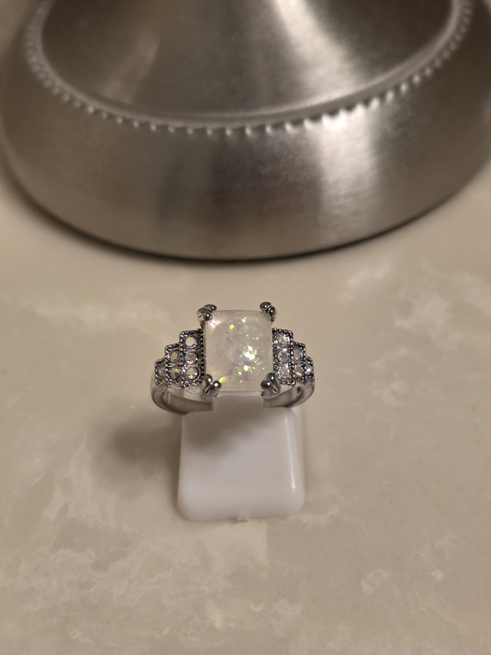 Opal Centerpiece Silver Ring with Sparkling Accent Stones